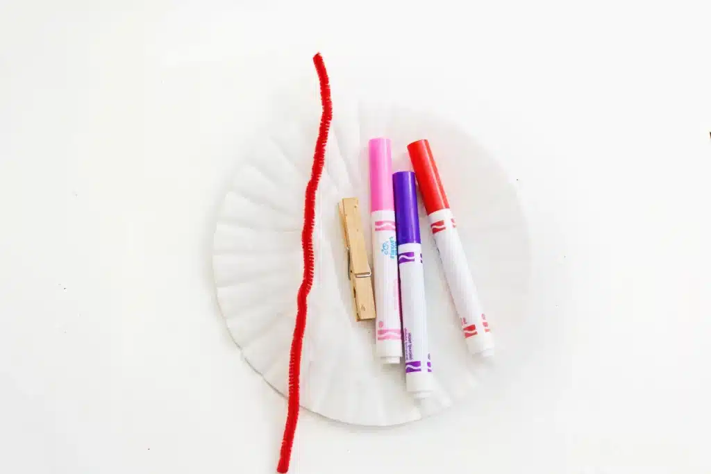 Coffee Filter Valentine Love Bugs - Cultivating Brilliant Minds coffee filters, red pipe cleaner, clothespin, and red, pink, and purple markers