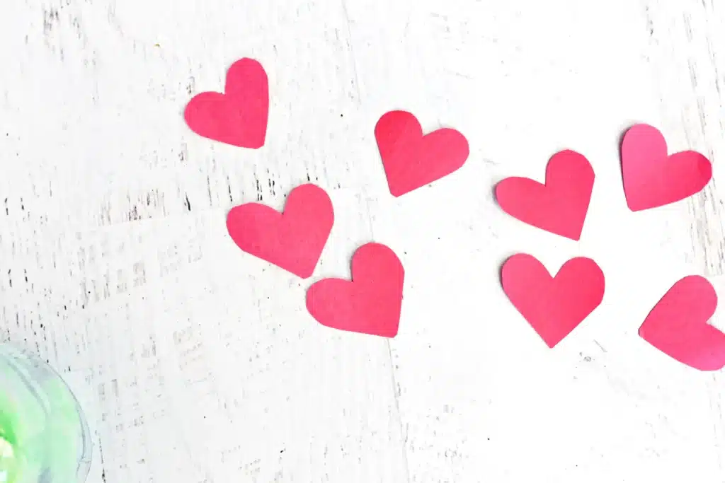 Grinch Heart Jar Challenge - Cultivating Brilliant Minds red hearts cut out of construction paper