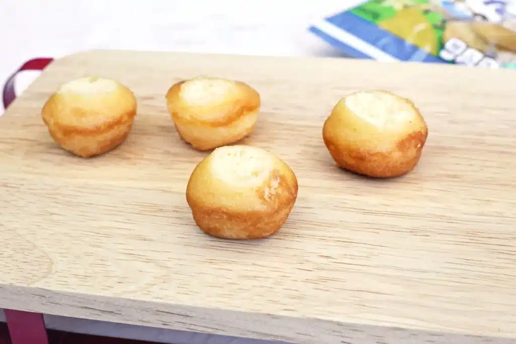 Santa Hat Muffins - Cultivating Brilliant Minds muffins with the tip cut off so they are even