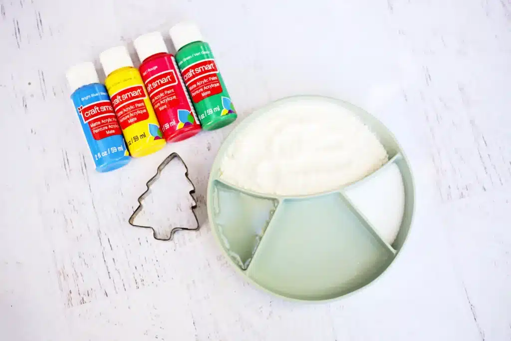Fingerprint Salt Dough Christmas Tree Ornament - Cultivating Brilliant Minds flour, salt, water, paint, and a christmas tree cookie cutter