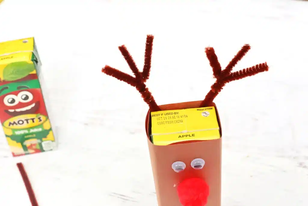 Rudolph Juice Boxes - Cultivating Brilliant Minds a juice box covered in brown paper and decorate to look like rudolph
