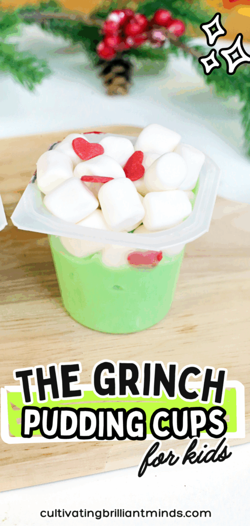 Grinch Pudding Cups - Cultivating Brilliant Minds a vanilla pudding cup dyed green with marshmallows and candy hearts
