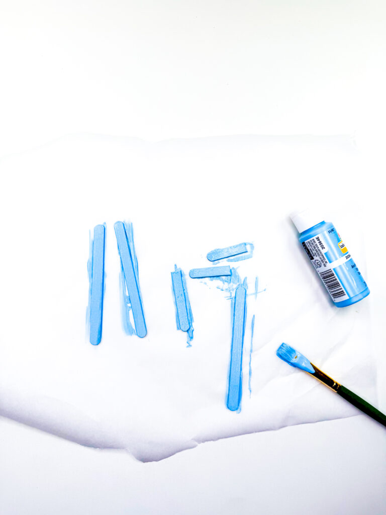 Menorah Craft - Cultivating Brilliant Minds popsicle sticks painted blue