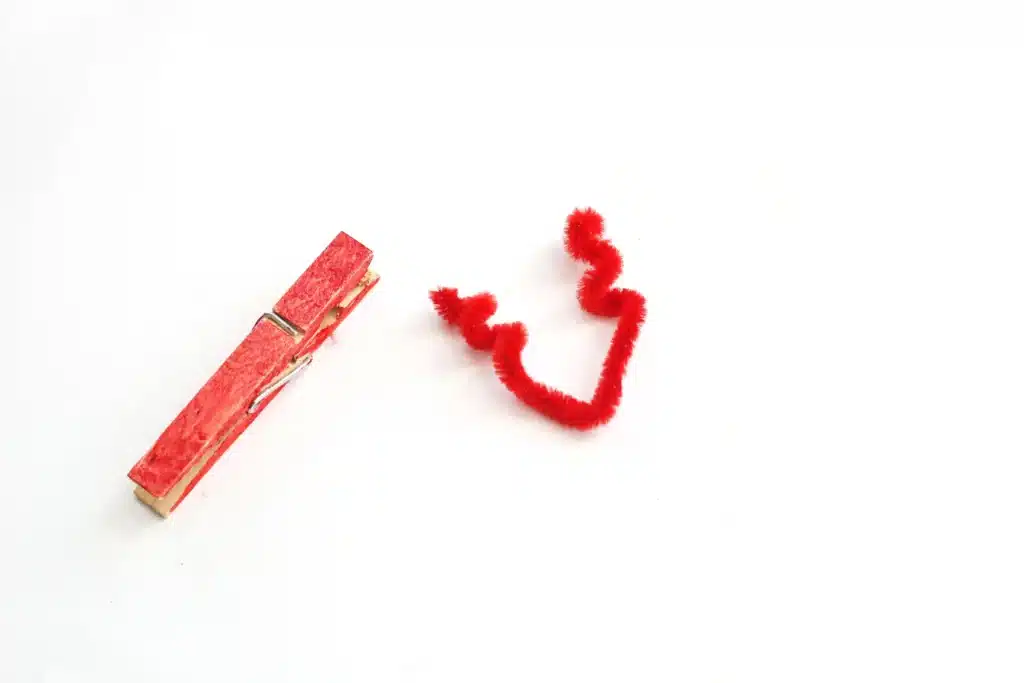 Coffee Filter Valentine Love Bugs - Cultivating Brilliant Minds a pipe cleaner shaped to look like antennae