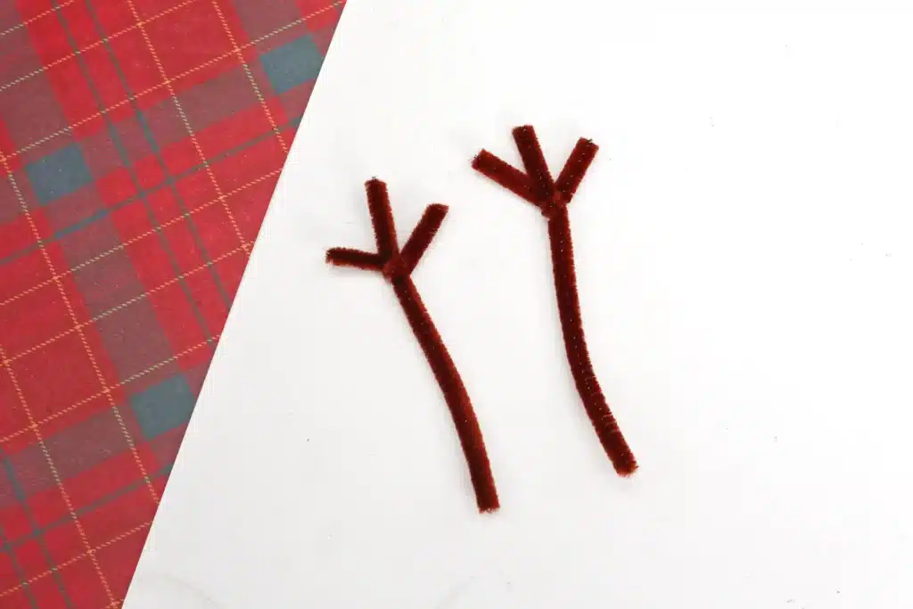 Rudolph Wood Slice Ornament - Cultivating Brilliant Minds brown pipe cleaners made to look like antlers