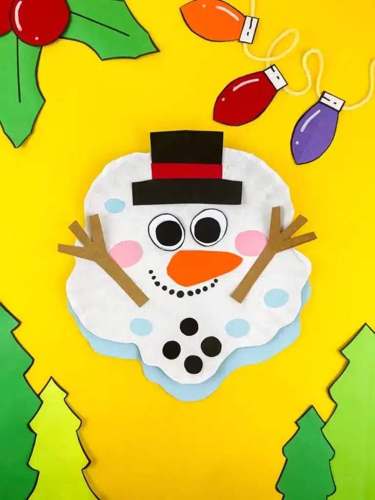 a paper plate craft decorated to look like a melted snowman