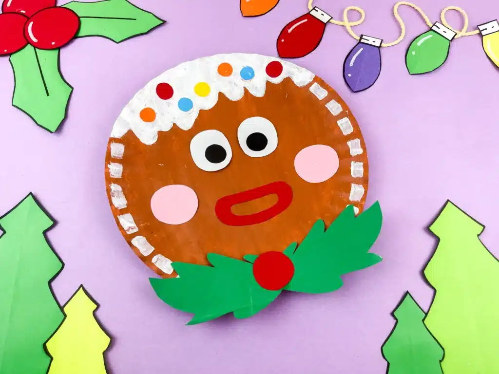 Gingerbread Paper Plate Craft - Cultivating Brilliant Minds a paper plate decorated to look like a gingerbread