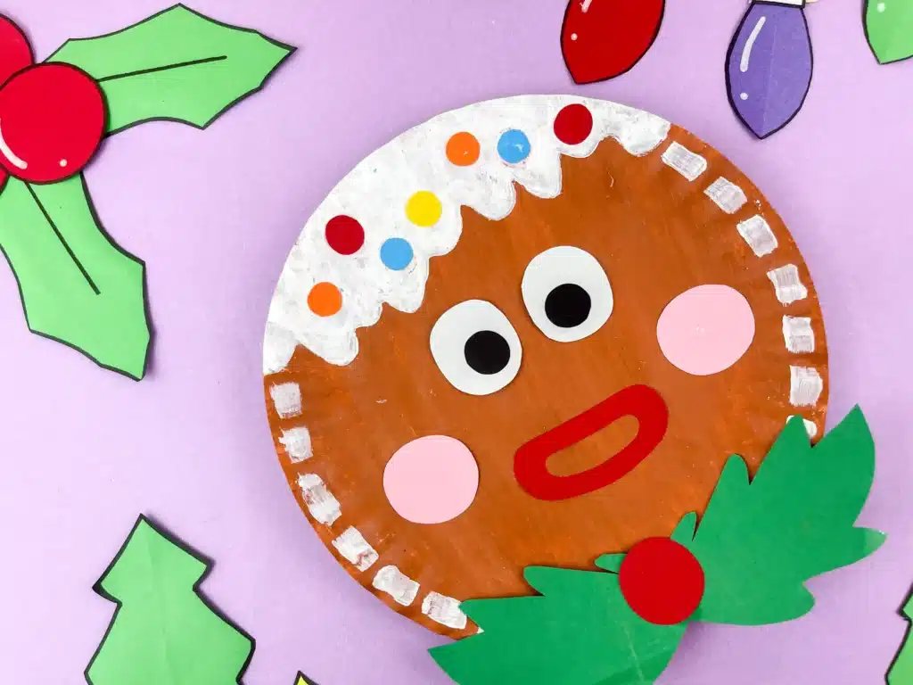 Gingerbread Paper Plate Craft - Cultivating Brilliant Minds a paper plate decorated to look like a gingerbread