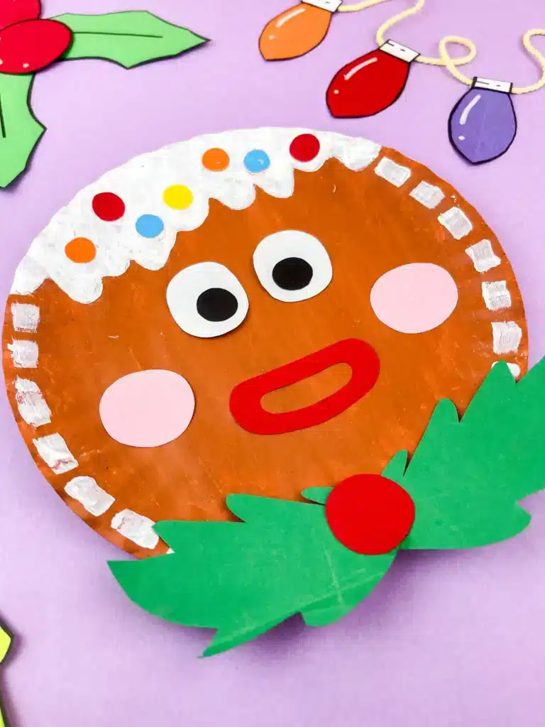 Gingerbread Paper Plate Craft - Cultivating Brilliant Minds a paper plate decorated to look like a gingerbread
