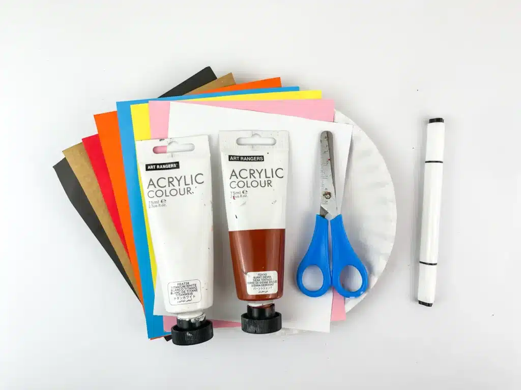 Gingerbread Paper Plate Craft - Cultivating Brilliant Minds construction paper, brown and white paint, a paper plate, scissors, and a marker