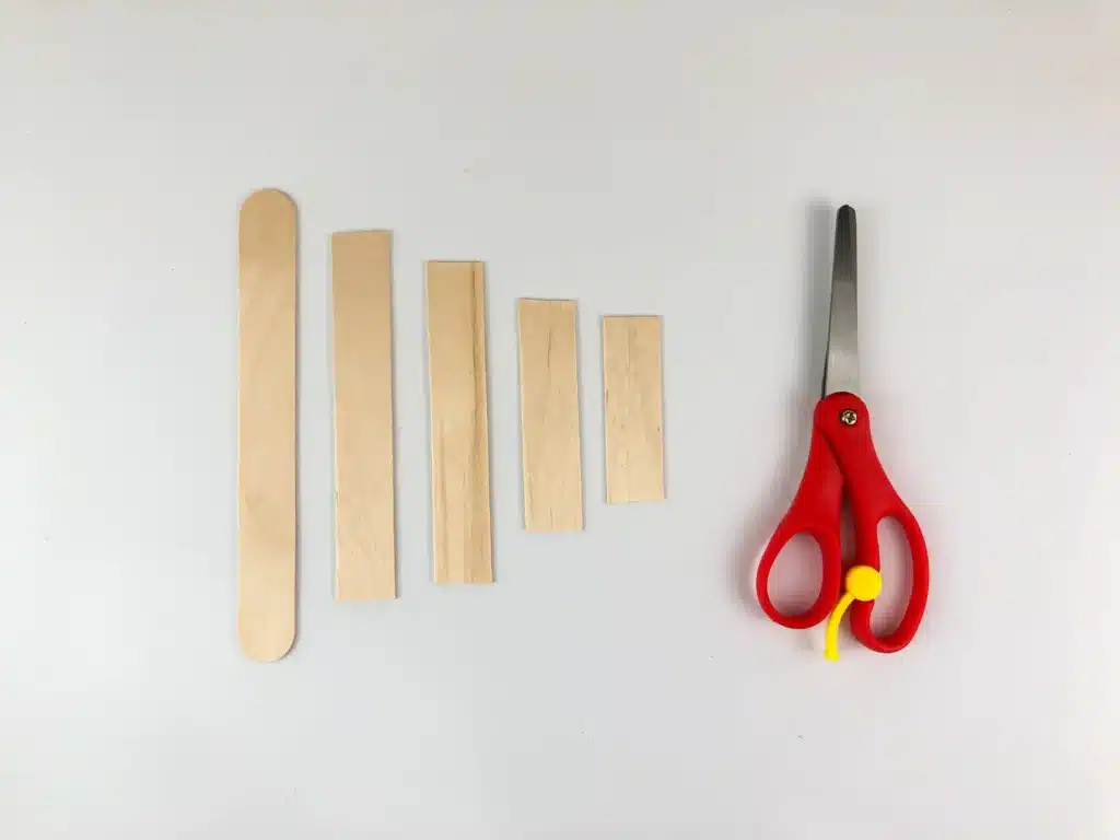 Christmas Tree Popsicle Stick Ornament - Cultivating Brilliant Minds popsicle sticks cut to look like a christmas tree