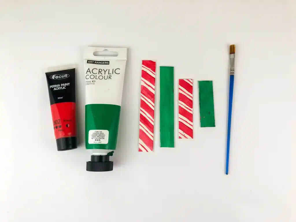 Christmas Tree Popsicle Stick Ornament - Cultivating Brilliant Minds popsicle sticks painted green and red and white