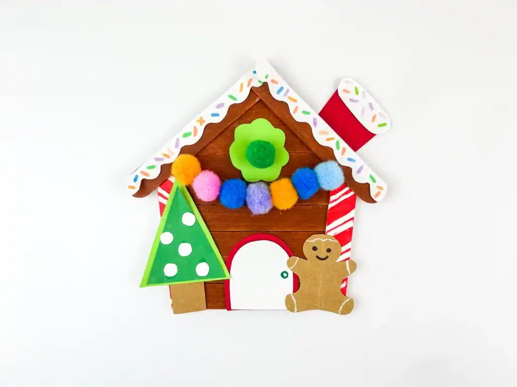 Gingerbread House Craft - Cultivating Brilliant Minds gingerbread house craft made out of popsicle sticks