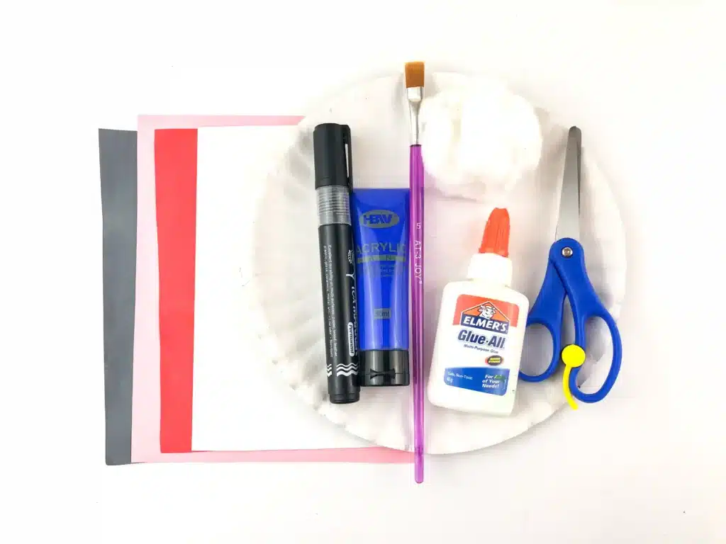 Moving Polar Bear Craft - Cultivating Brilliant Minds construction paper, paper plate, paint brush, blue paint, cotton, scissors, glue, and a black marker