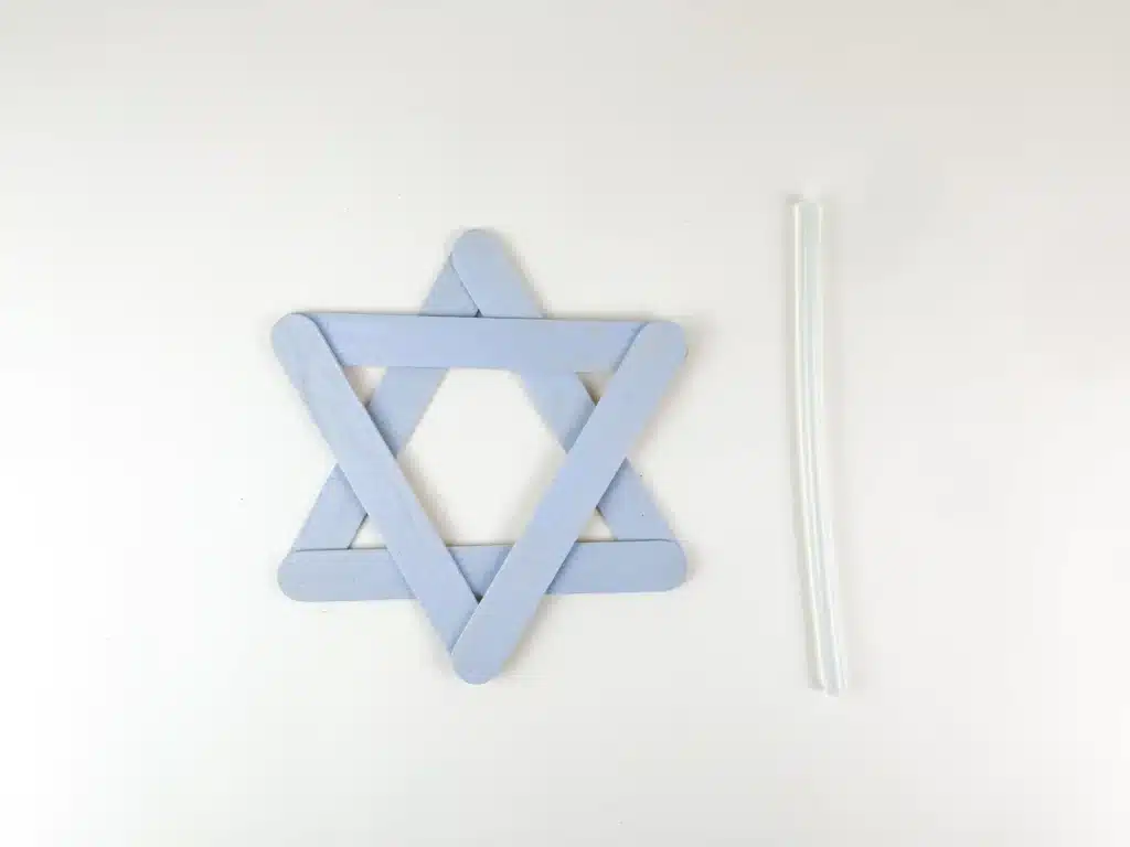 Star of David Craft - Cultivating Brilliant Minds blue popsicle sticks glued together to look like the star of david