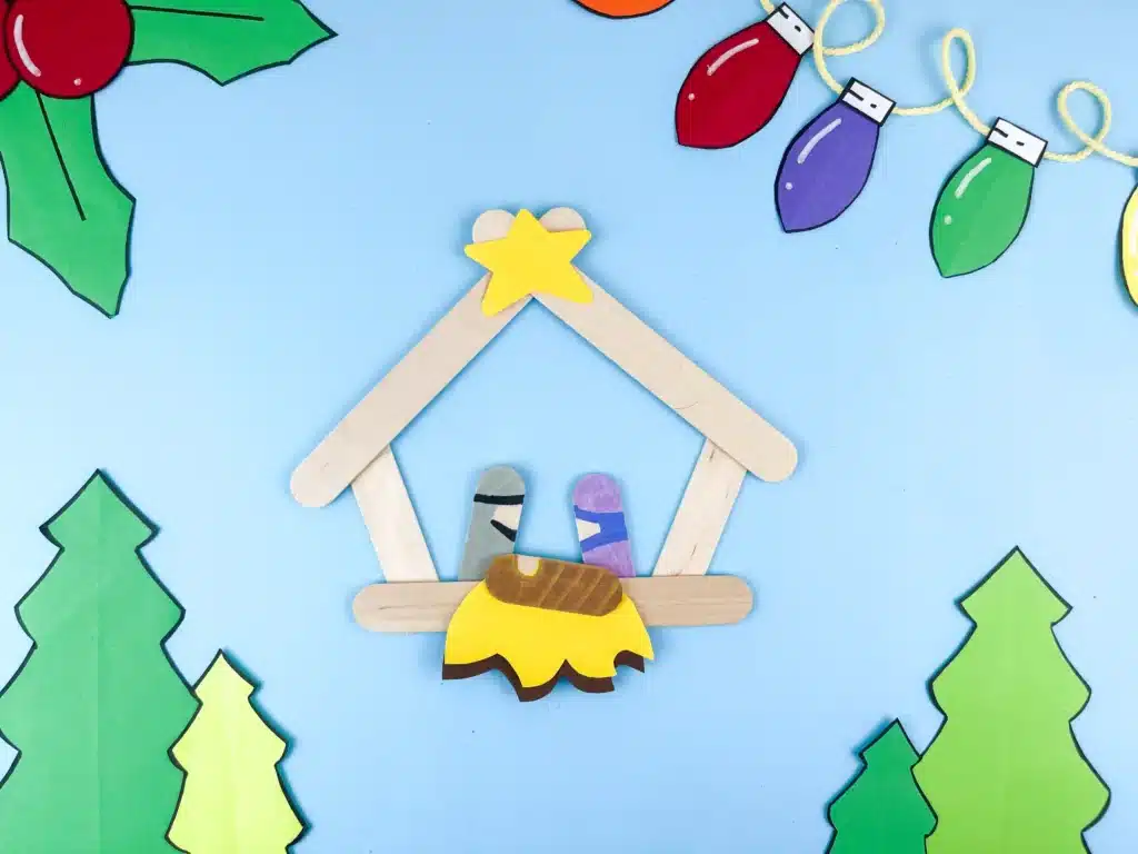 Nativity Popsicle Stick Craft - Cultivating Brilliant Minds a nativity scene made out of popsicle sticks and construction paper