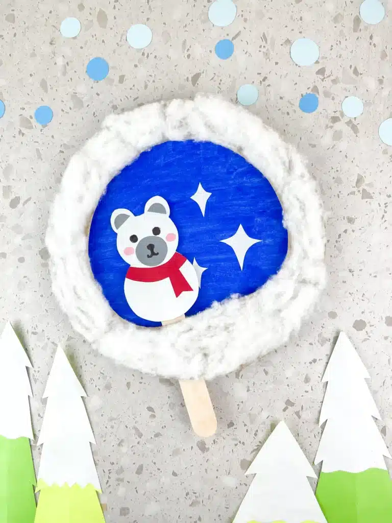 Moving Polar Bear Craft - Cultivating Brilliant Minds moving polar bear craft: a paper plate craft with a polar bear attached to a popsicle stick so it can move back and forth