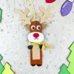 Reindeer Popsicle Stick Ornament Craft - Cultivating Brilliant Minds popsicle sticks glued together and decorated to look like a reindeer