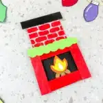 Fireplace Popsicle Stick Craft - Cultivating Brilliant Minds popsicle sticks and construction paper glued together to make a fireplace popsicle stick craft