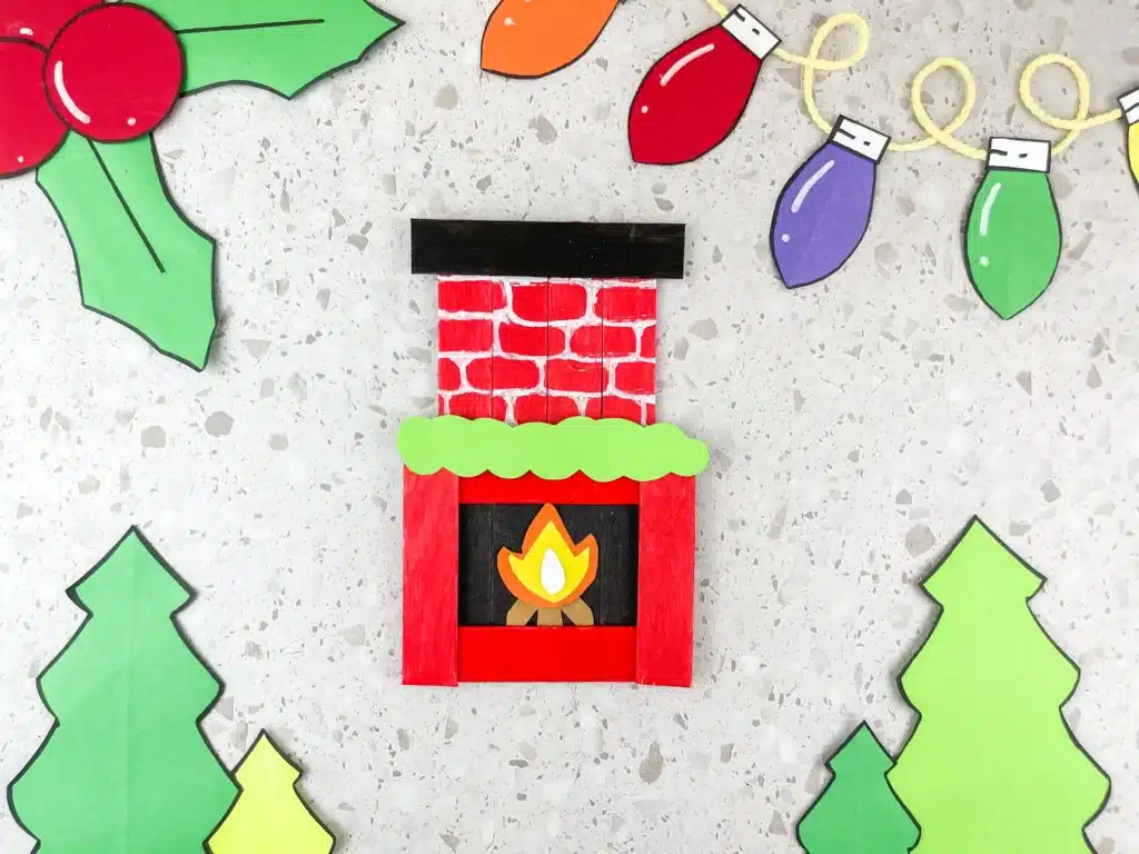 Fireplace Popsicle Stick Craft - Cultivating Brilliant Minds popsicle sticks and construction paper glued together to make a fireplace popsicle stick craft