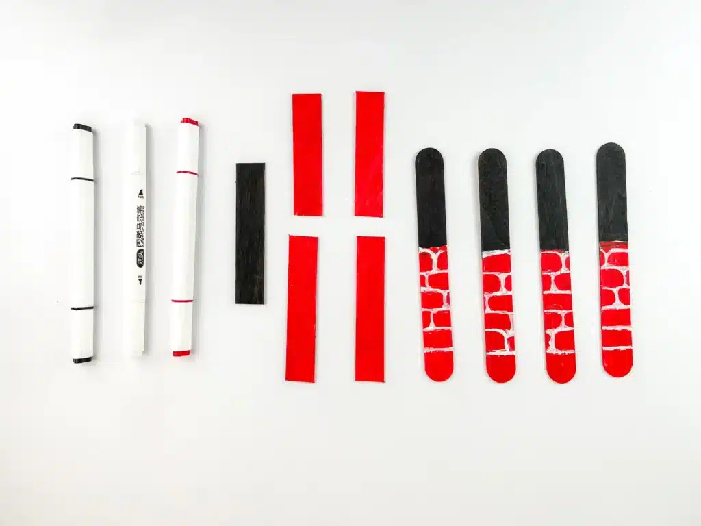 Fireplace Popsicle Stick Craft - Cultivating Brilliant Minds popsicle sticks painted to look like brick of a fireplace