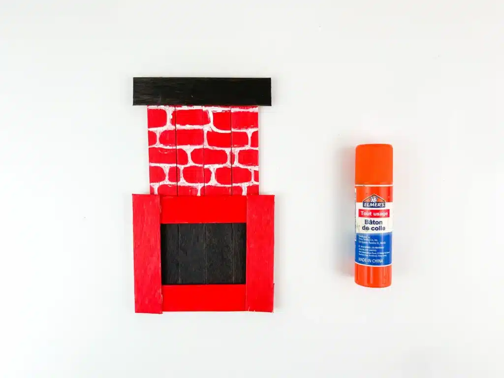 Fireplace Popsicle Stick Craft - Cultivating Brilliant Minds popsicle sticks and construction paper glued together to look like a fireplace
