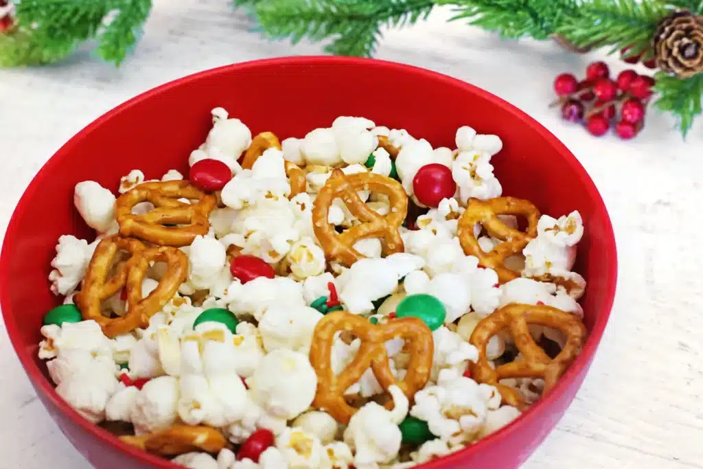 Rudolph Popcorn Snack - Cultivating Brilliant Minds rudolph popcorn snack mix with pretzels and m&ms in a bowl