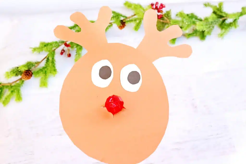 Rudolph Ring Pop Craft - Cultivating Brilliant Minds a reindeer craft made of construction paper using a ring pop as the nose