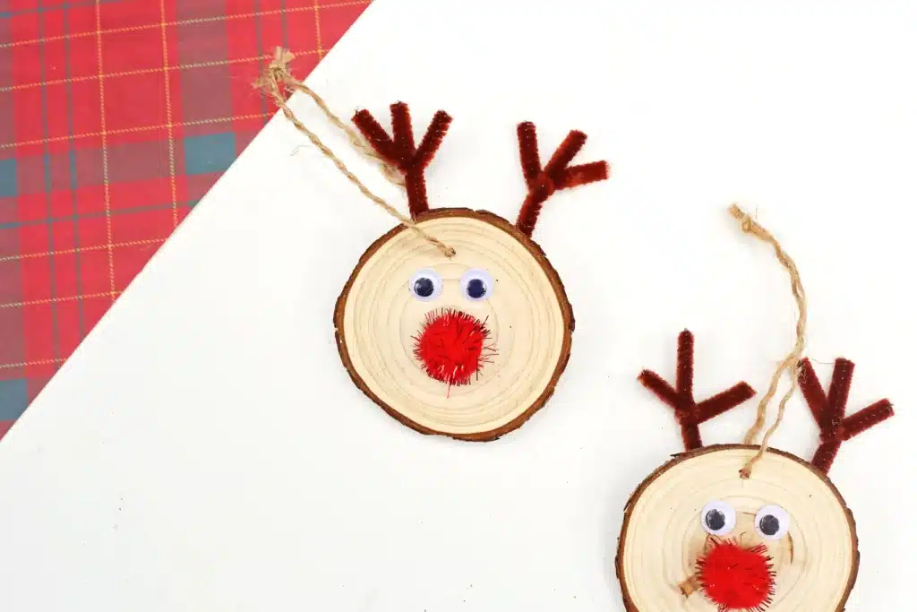 Rudolph Wood Slice Ornament - Cultivating Brilliant Minds a wood slice decorated to look like rudolph and made into an ornament for the tree