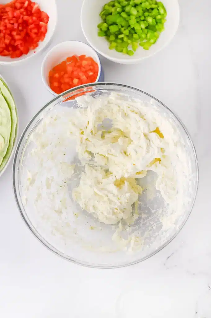 Christmas Pinwheels - Cultivating Brilliant Minds cream cheese and ranch seasoning in a bowl