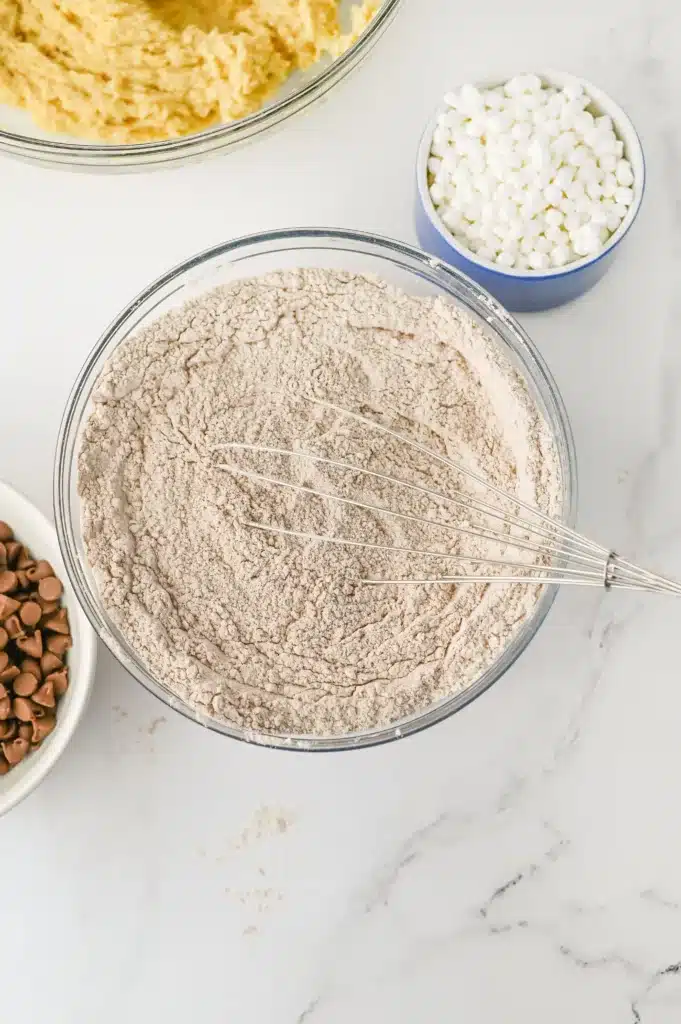Hot Chocolate Cookies - Cultivating Brilliant Minds dry ingredients in a bowl with a whisk