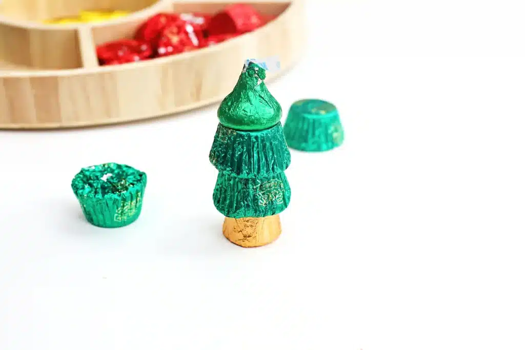 Candy Christmas Tree - Cultivating Brilliant Minds candies stacked on top of each other to look like a christmas tree