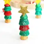 Candy Christmas Tree - Cultivating Brilliant Minds candies stacked on top of each other with a star sticker on top to look like a christmas tree