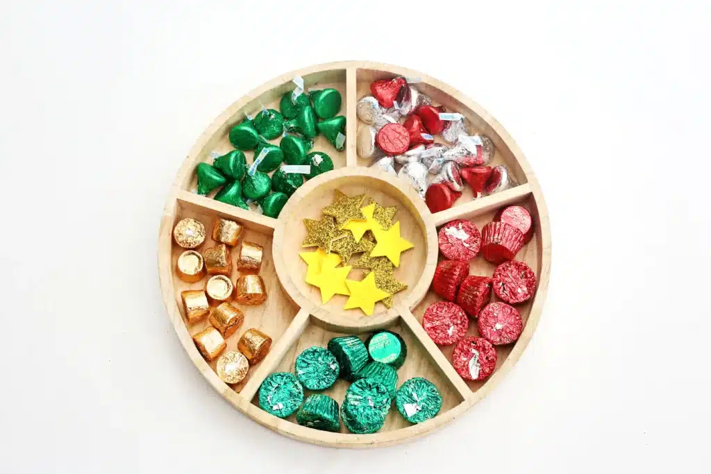 Candy Christmas Tree - Cultivating Brilliant Minds rolos, reeses candies, christmas hershey kisses and star stickers