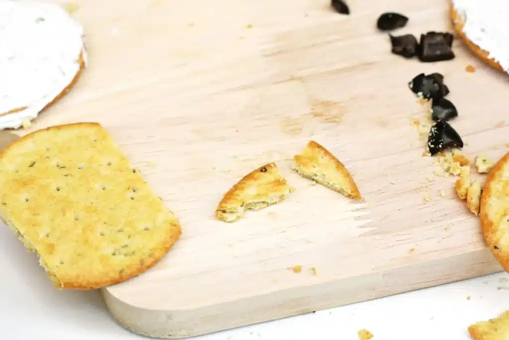 Savory Polar Bear Snacks - Cultivating Brilliant Minds a cracker with two ends cut off to be the polar bear's ears