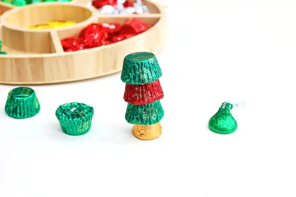 Candy Christmas Tree - Cultivating Brilliant Minds candies stacked on top of each other to look like a christmas tree