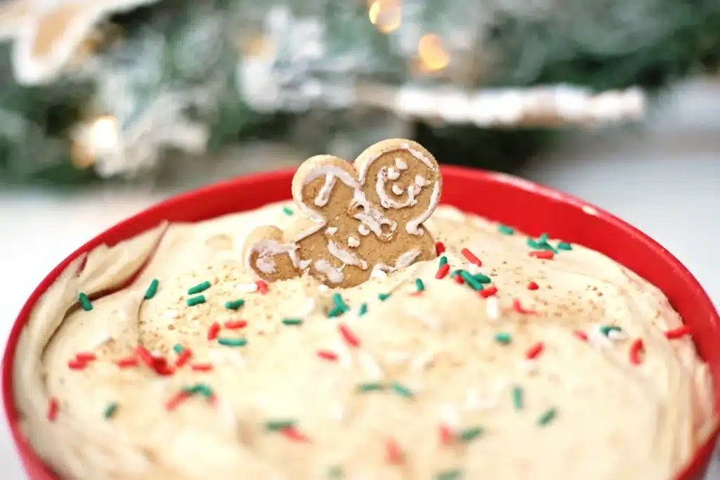 Gingerbread Dip - Cultivating Brilliant Minds gingerbread dip with gingerbread cookies and christmas sprinkles in a bowl