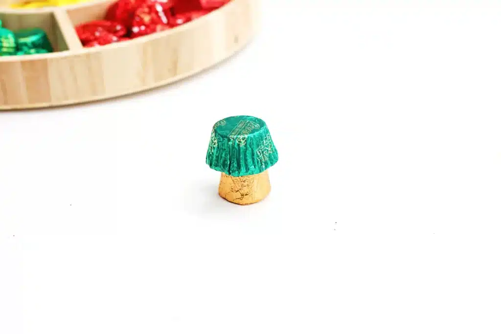 Candy Christmas Tree - Cultivating Brilliant Minds a rolo glued to a reeses with a green wrapper