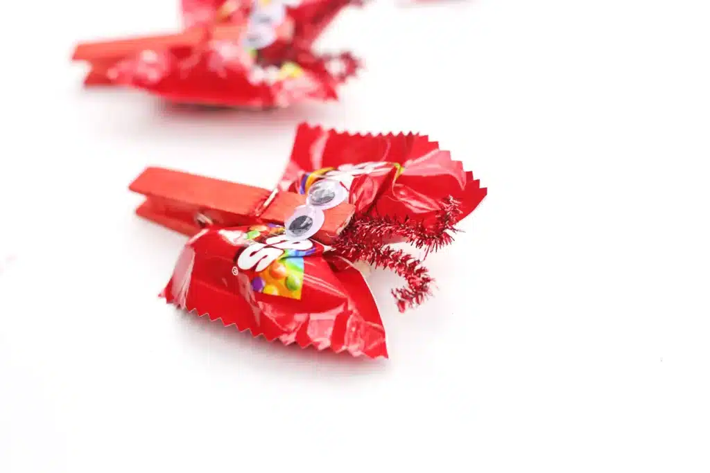 Valentine Candy Love Bugs - Cultivating Brilliant Minds valentine candy love bugs using a clothespins and snack bags of skittles