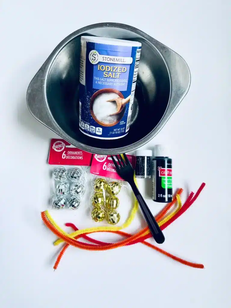 New Year's Eve Sensory Bin - Cultivating Brilliant Minds supplies to make the new year's eve sensory bin