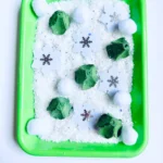 Egg Carton Sensory Bin - Cultivating Brilliant Minds an egg carton sensory bin for winter