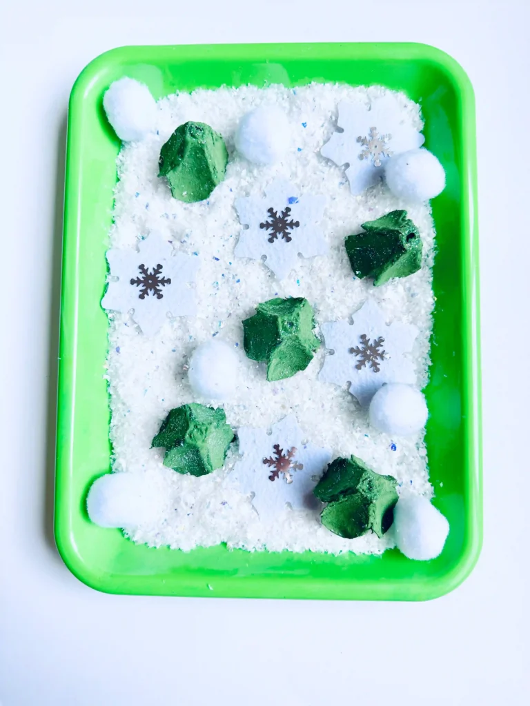 an egg carton sensory bin for winter