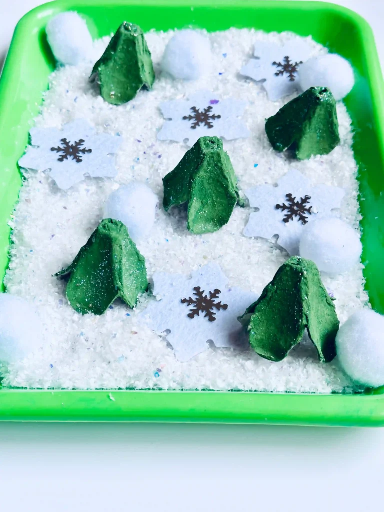 Egg Carton Sensory Bin - Cultivating Brilliant Minds an egg carton sensory bin for winter
