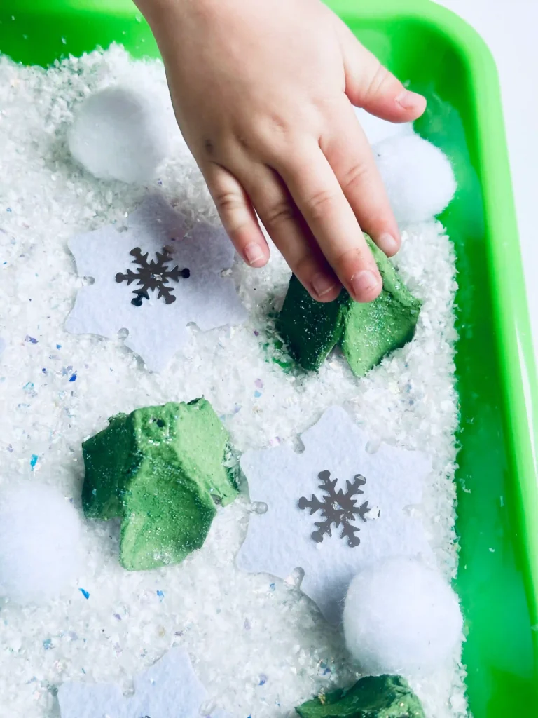 Egg Carton Sensory Bin - Cultivating Brilliant Minds an egg carton sensory bin for winter