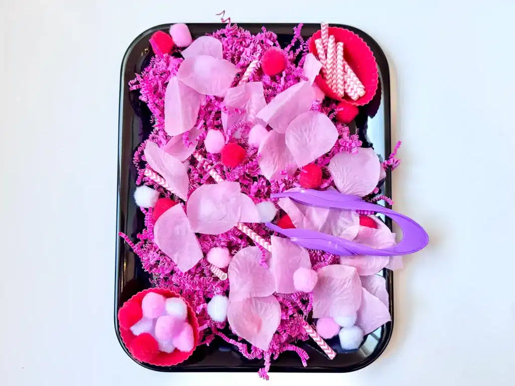 Valentine's Day Sensory Bin - Cultivating Brilliant Minds a valentine's day sensory bin with rose petals and pom poms
