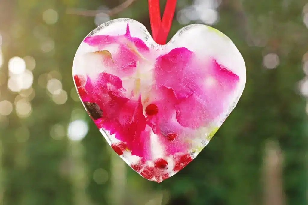 Ice Heart Suncatchers - Cultivating Brilliant Minds ice heart suncatcher made with leaves, petals, and betties