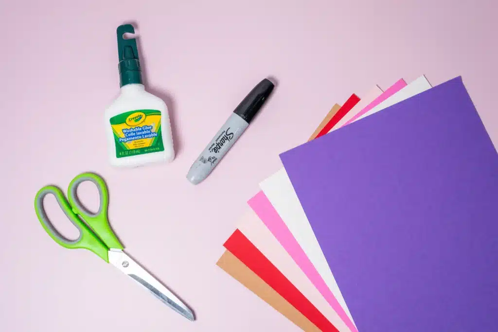 Valentine's Day Heart Tree Craft - Cultivating Brilliant Minds colored construction paper, black marker, glue, and scissors