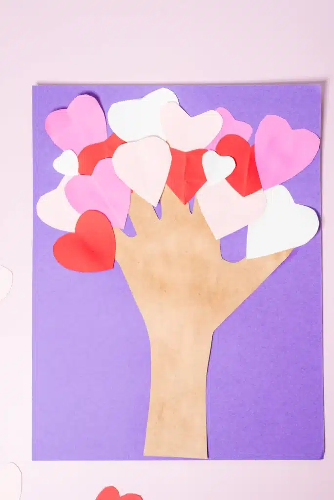 Valentine's Day Heart Tree Craft - Cultivating Brilliant Minds valentine's day handprint heart tree craft with the trunk a traced handprint and the tree is made of hearts