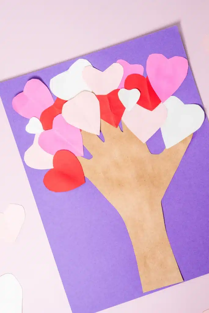 Valentine's Day Heart Tree Craft - Cultivating Brilliant Minds valentine's day handprint heart tree craft with the trunk a traced handprint and the tree is made of hearts