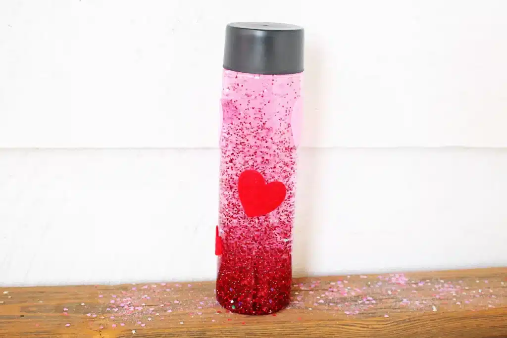 Love Potion Valentine Sensory Bottle - Cultivating Brilliant Minds love potion valentine sensory bottle with red glitter for valentine's day